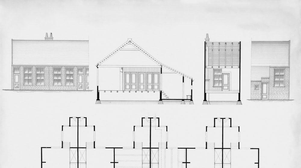 Plan d'architecte posé sur une table